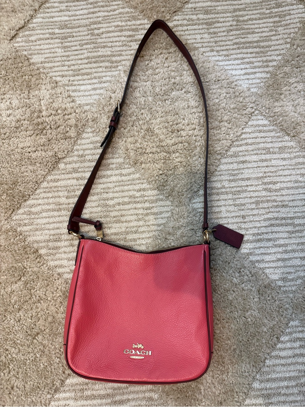 Coach Pebbled Leather Crossbody in Raspberry with Brown Strap